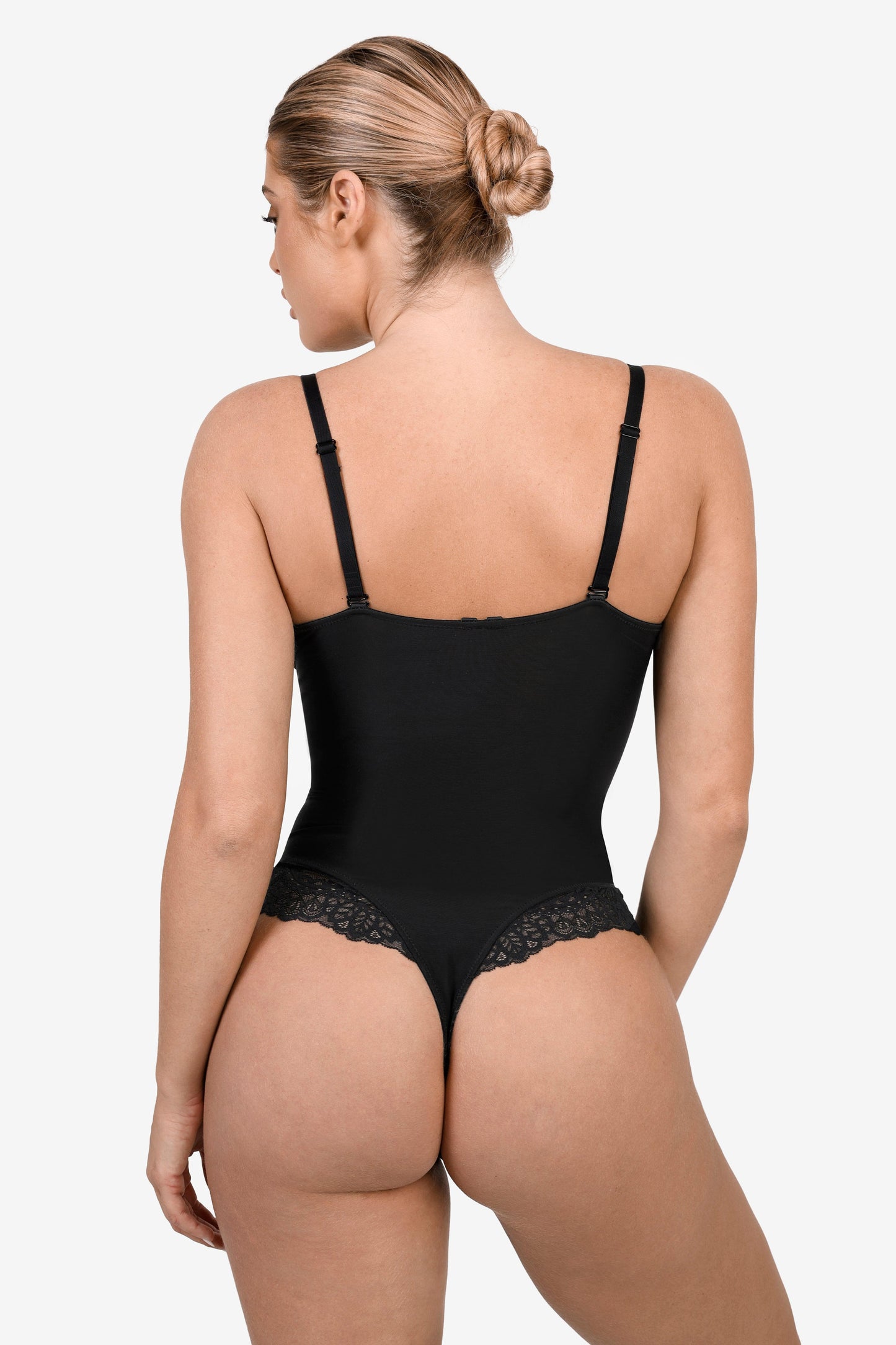 Ensemble de Body en Dentelle à Col V Profond et Jupe Midi en Similicuir