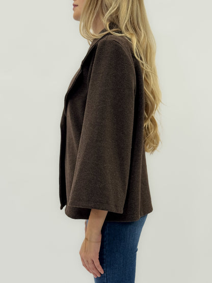 Veste avec bouton bijou