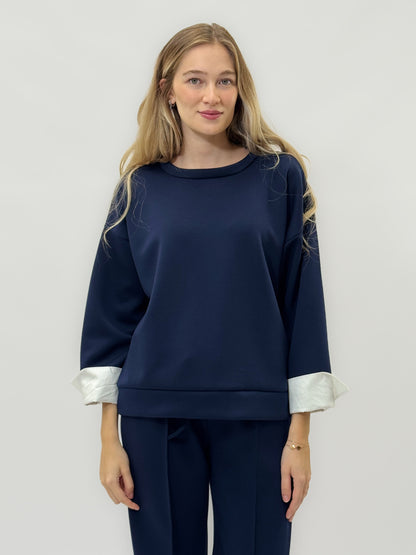 Ensemble en tissu technique avec sweat à capuche oversize et pantalon palazzo