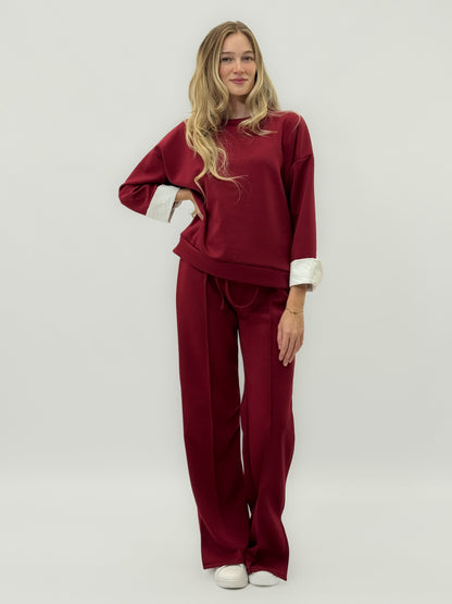 Ensemble en tissu technique avec sweat à capuche oversize et pantalon palazzo