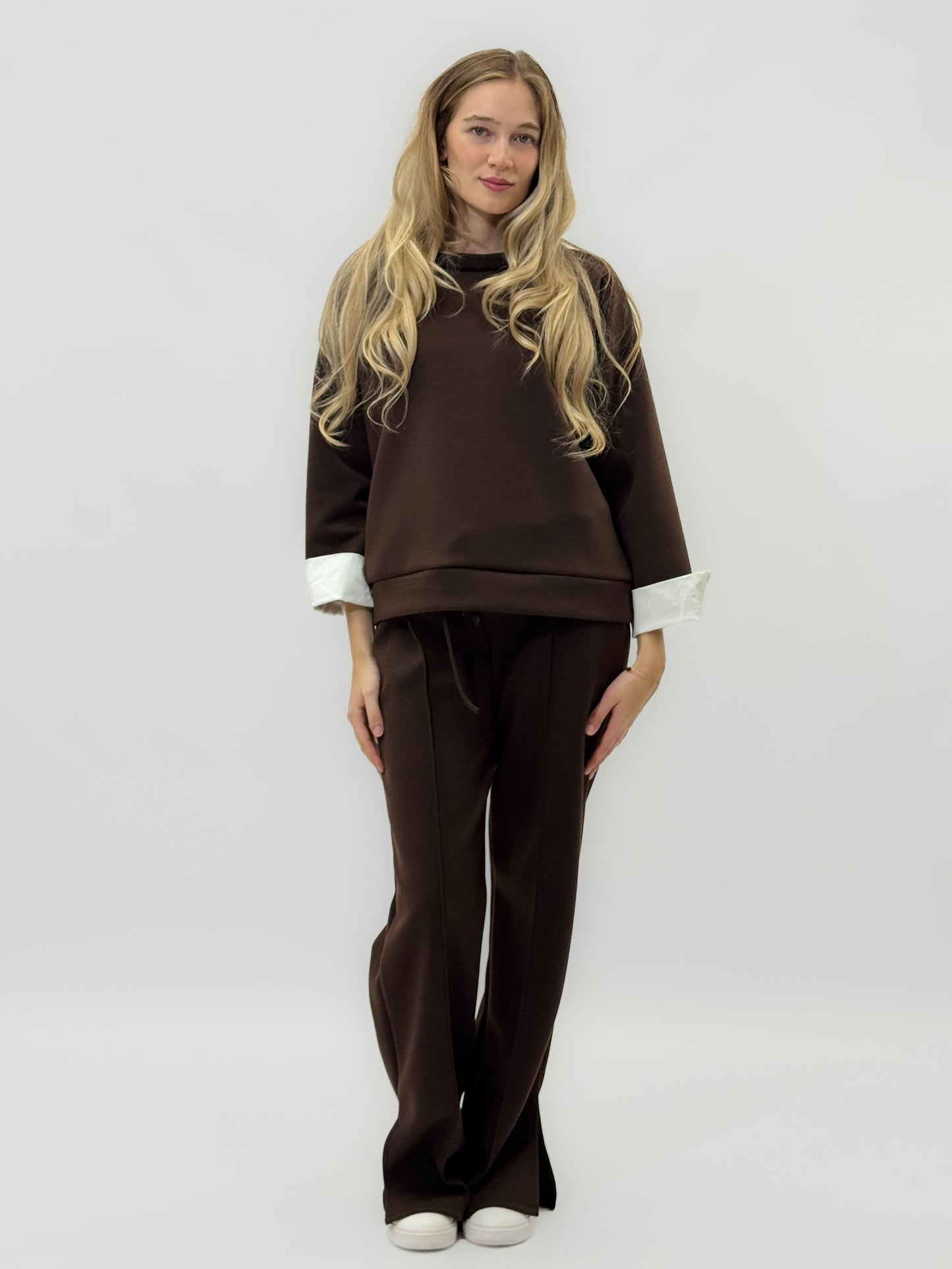 Ensemble en tissu technique avec sweat à capuche oversize et pantalon palazzo