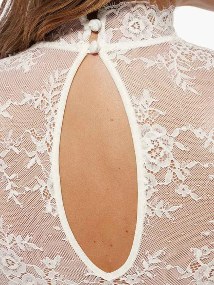 Body en dentelle florale à manches longues et col montant